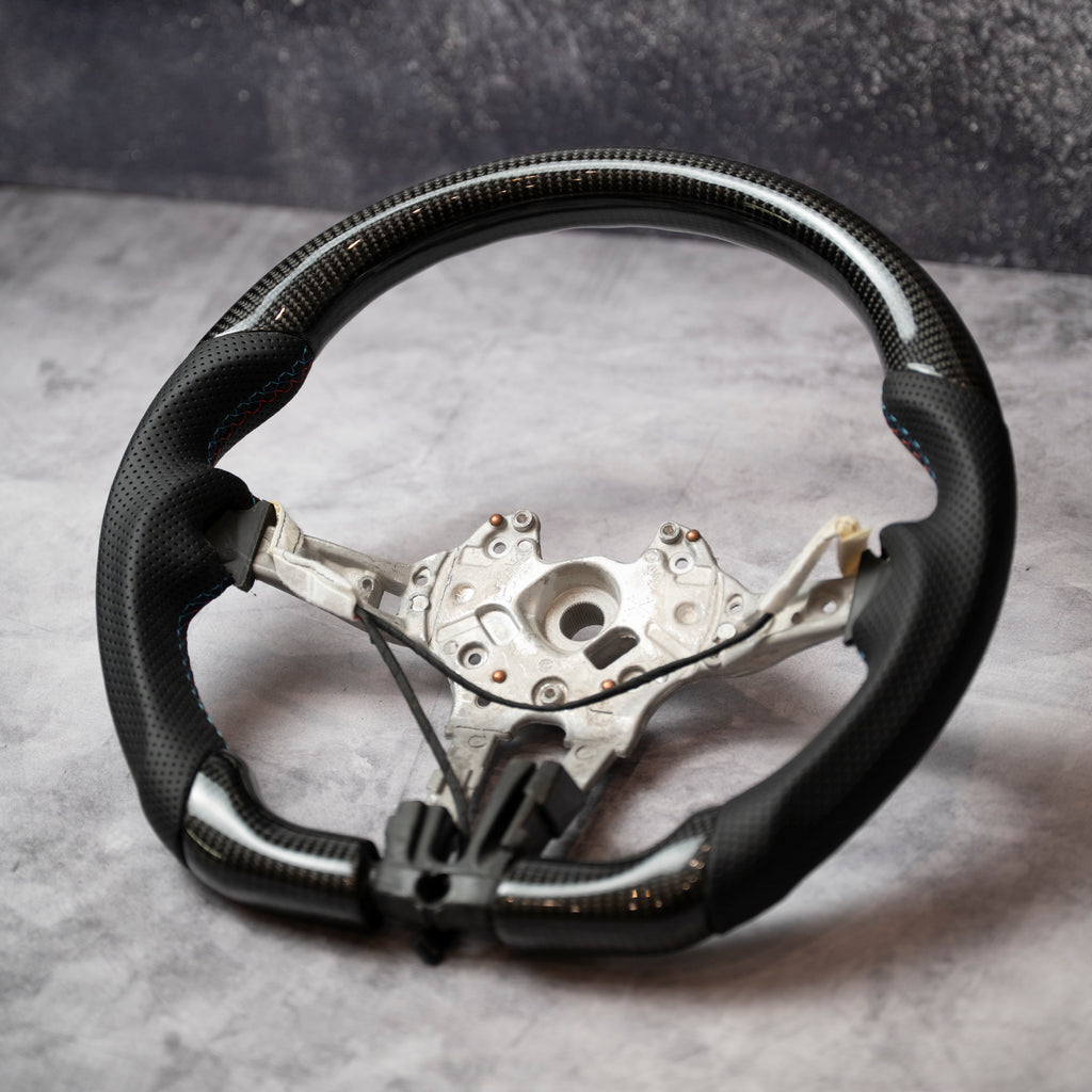 Carbon Steering HWeel with perforated leather - ALL F SERIES